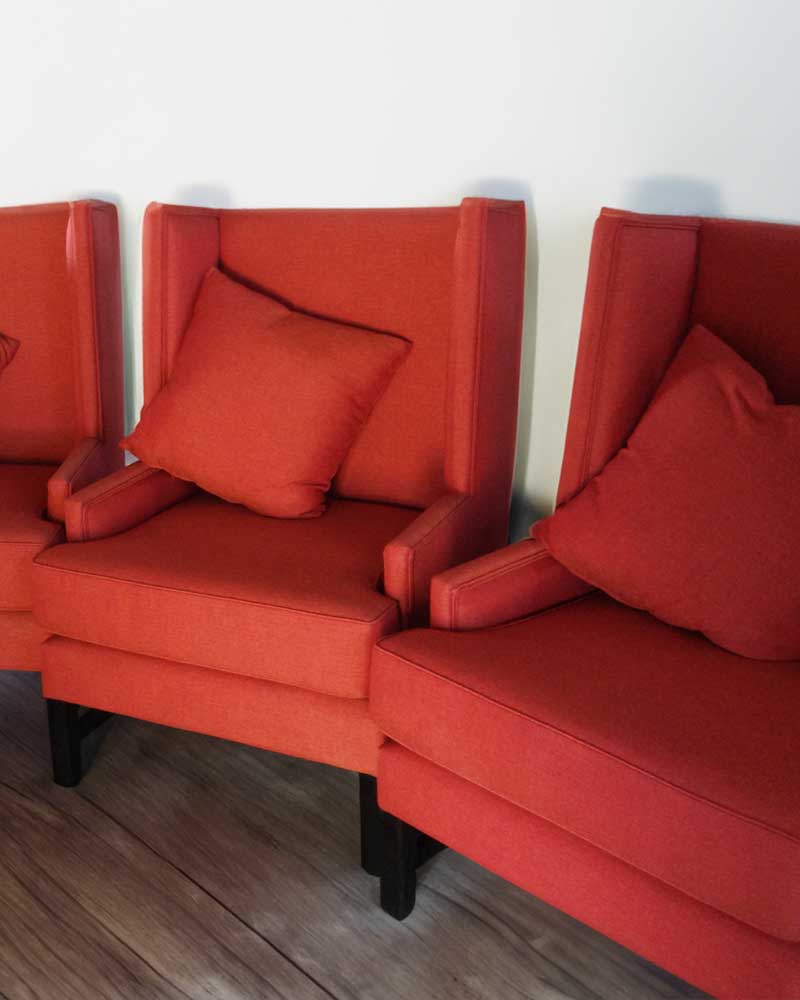 villa reupholstered red chairs